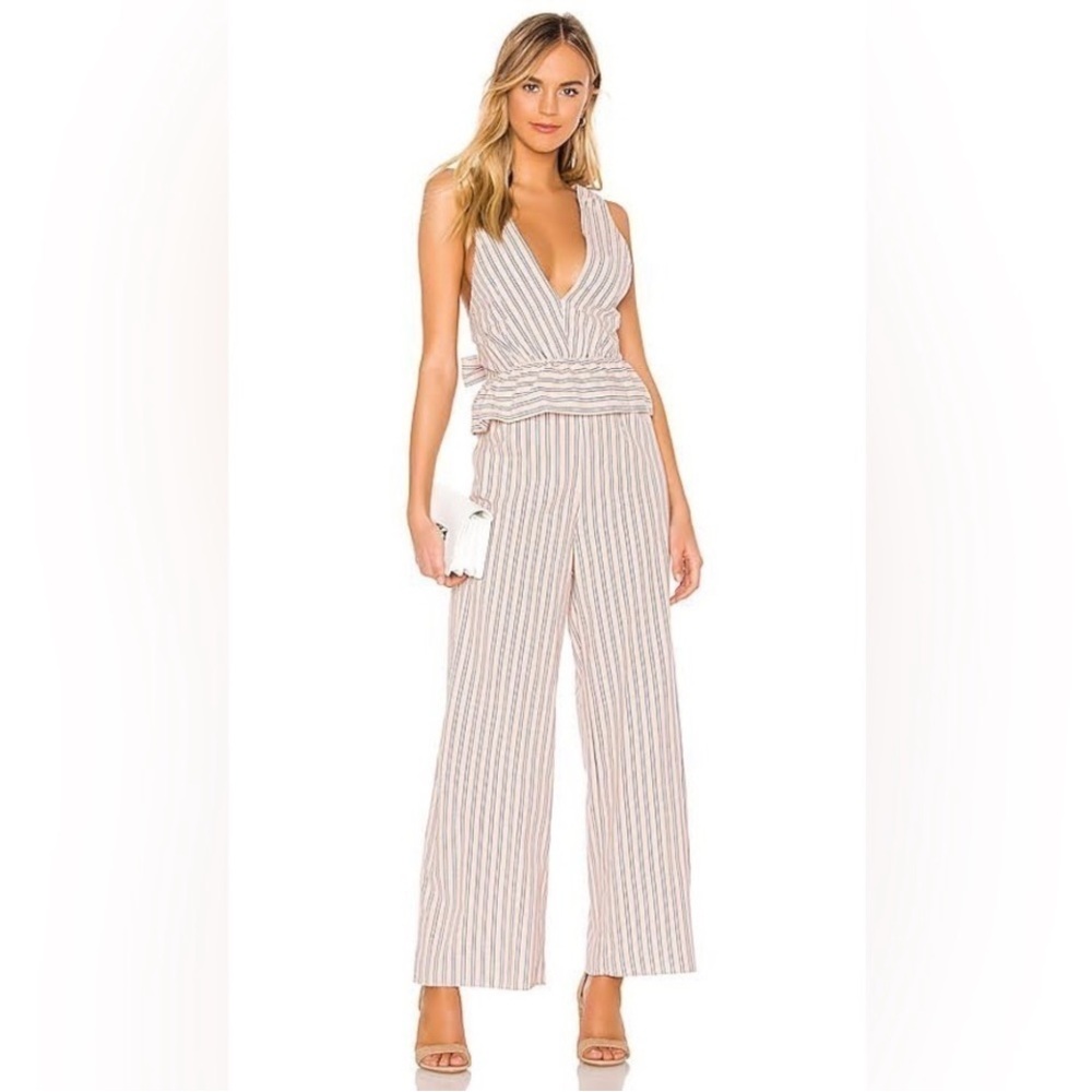 Saylor x Revolve Kasandra Striped Peplum V-Neck Criss Cross Wide
Leg Jumpsuit